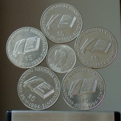 image:   Standing Pentagonal Rose / Mandala of coins of Argentina (centre: 50 centavos 1941, ring:  5 peso 1994 Convencin Nacional Constituyente) 